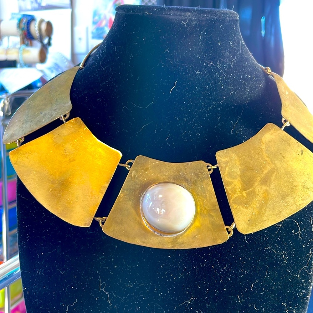 Coppper bib necklace with a taupe colored stone